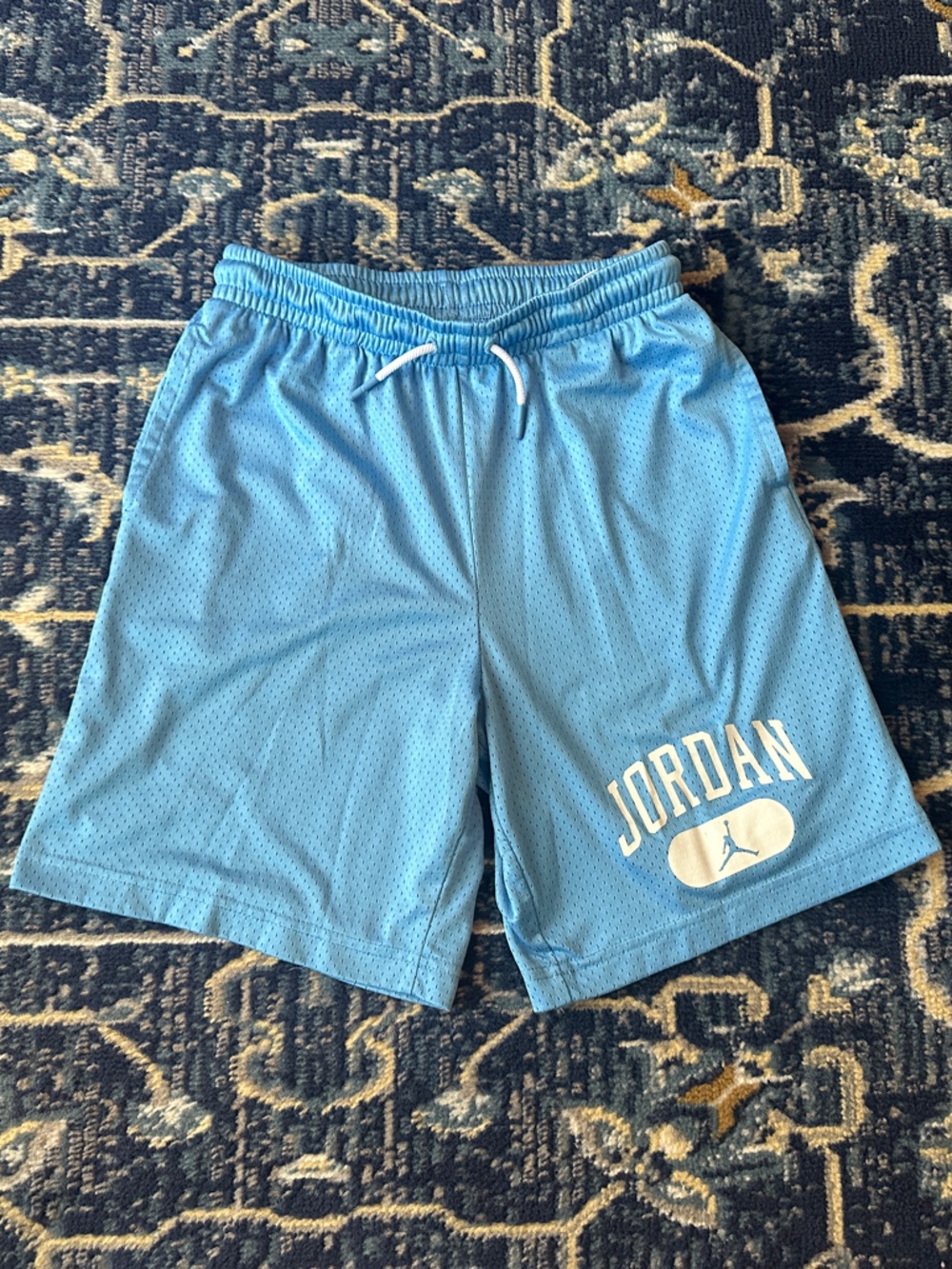 Jordan Sky Blue Mesh Athletic Shorts with White Logo